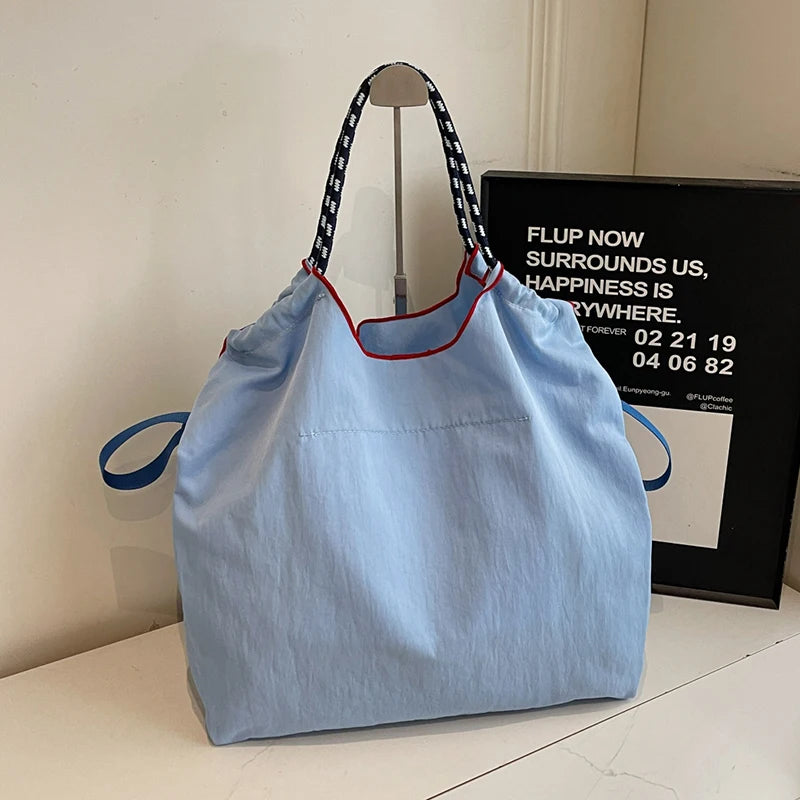 Embroidered handbags with niche designs, lightweight and portable large capacity shopping bags, fashionable retro handbags, and