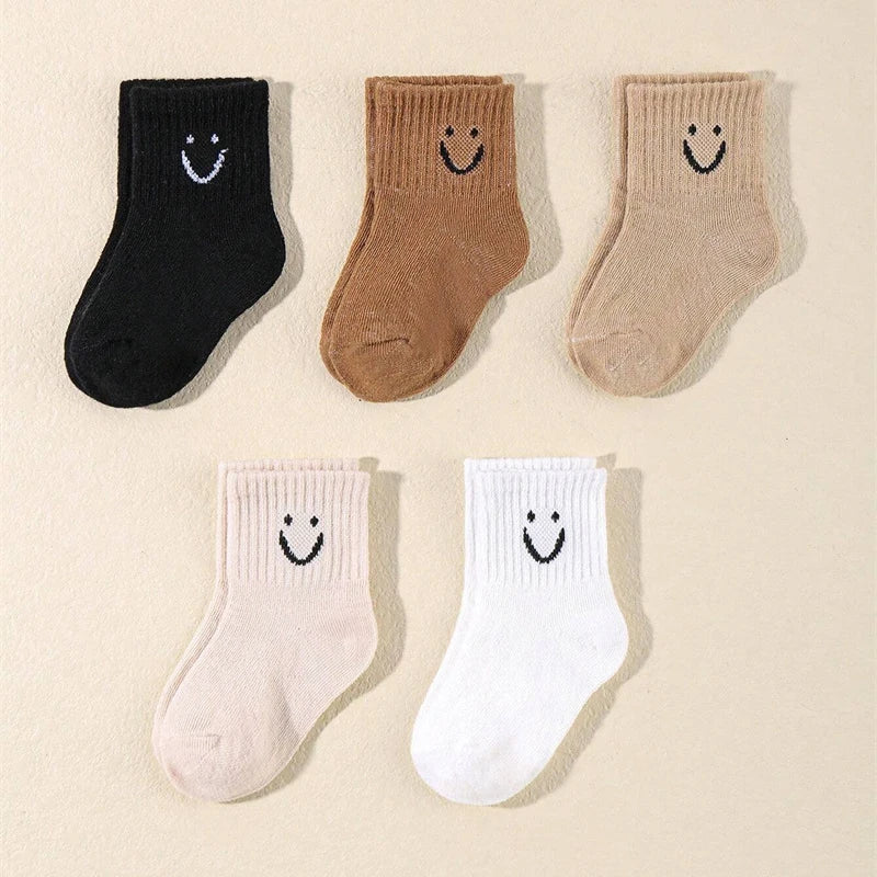 10 pairs of cute solid-color smiling face pattern children's mid-calf socks, suitable for boys and girls socks